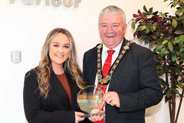 Tori McIntyre, winner support worker of the year at the National Learning Disability and Autism awards, pictured with Cllr Ivor Wallace Mayor of Causeway Coast and Glens Borough Council at a civic reception at council headquarters in Coleraine