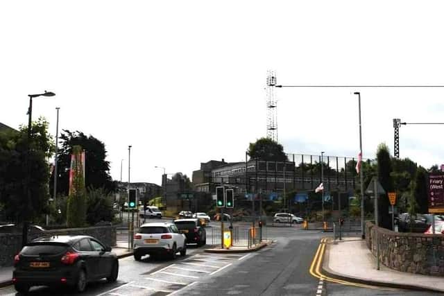 A photomontage showing what the 25-metre phone mast would have looked like in comparison to the existing 40-metre PSNI mast. Credit: ABC planning portal