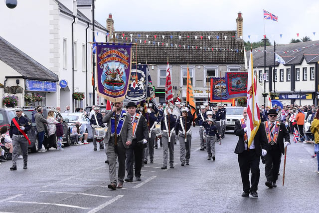 The parade makes its way around the town to the main demonstration field.