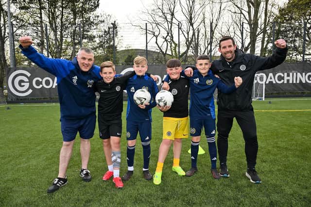 Young players Keenan Murray, Kylan Morrison, Ciaran McKee and Corey Caldwell and coaches Paul Caldwell and Damian Murray from Shankill Juniors FC and St Oliver Plunkett FC U13s pictured ahead of their joint trip to the prestigious Holland Cup in April 2025 as part a cross-community initiative uniting two of Belfast’s leading grassroots clubs through football, friendship and shared ambition.