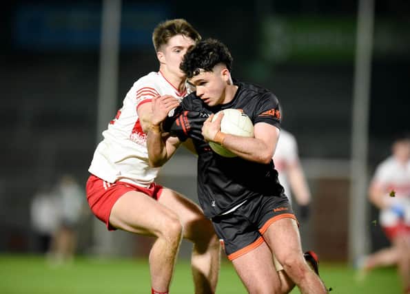 Callum O’Neill (pictured in action against Derry) had a good game as Armagh U20s were narrowly beaten by Cavan.