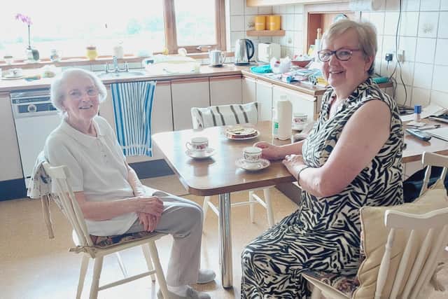 Maureen and volunteer Sheila from Living Well Moyle. Age NI has received a £5,500 grant from The National Lottery Community Fund to deliver their Living Well Moyle service to support older people in rural and hard to reach areas. Credit National Lottery
