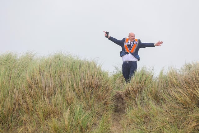 Making the way through the dunes to the beach