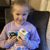 Six-year-old Emily from Greenisland with her Buzzy, which helps her deal with insulin injections