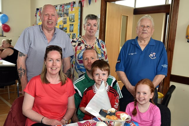 Members of the Simmons and Walker families pictured at the Loughgall coronation tea party on Monday. PT18-261.