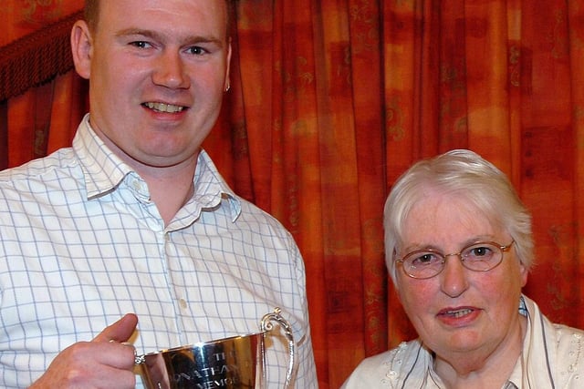 Winner of the Jonathan Derby Memorial Cup Andrew Ewing and runner-up Betty Watterson pictured at the Woods Bowling Club presentation dinner held in the Royal Hotel in 2007.