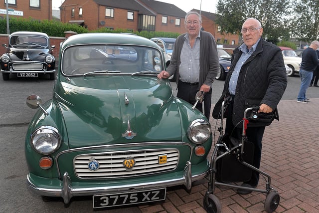 Stanley Fee, left, and Mahon Hall resident Noel McCammick admiring a 1960s Morris Minor at the vintage evening on Friday. PT36-210.