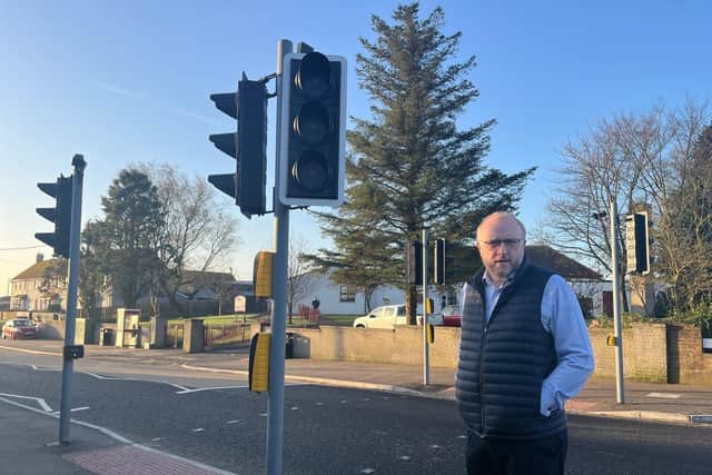 Councillor Andrew Gowan has risen concerns about the puffin crossing outside Annahilt Primary School. Pic credit: LDRS