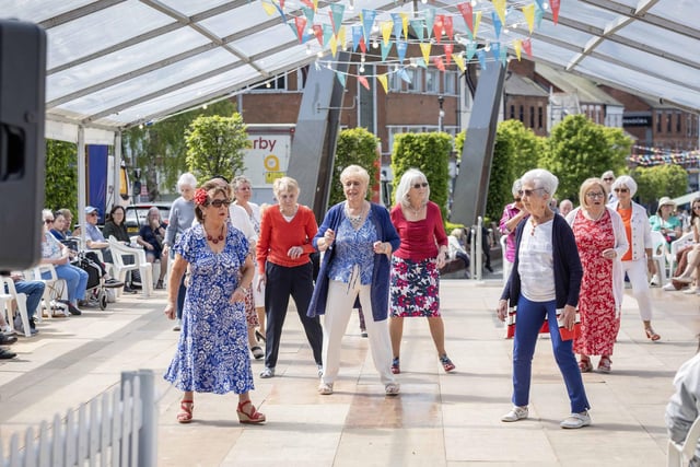 Taking part in the celebratory tea dance in Market Square, Lisburn.