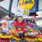 Linda Robinson Chief Executive of Age NI, Boxer and MBE Carl Frampton and Sarah McKenna, Lidl Sales Operations Manager