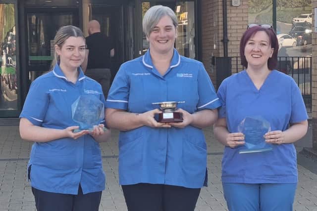 Aiobhin McElroy, Shelley Taylor and Gemma Harper pictured with their Northern Ireland Practice and Education Council (NIPEC) for Nursing and Midwifery awards at Antrim Area Hospital, where all three of them now work after completing their Nursing degrees through the Open University. Photo: Northern Health and Social Care Trust