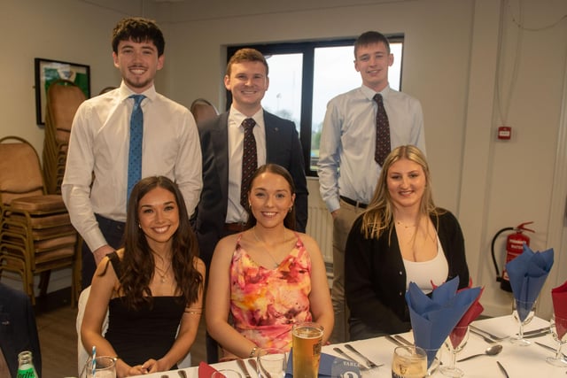 All smiles at the anniversary dinner from, back row from left, Joshua Smyth, Adam Speers and John Speers. Front from left, Hannah Farragher, Molly Somerville and Camilla Anorikyte. PT15-232.