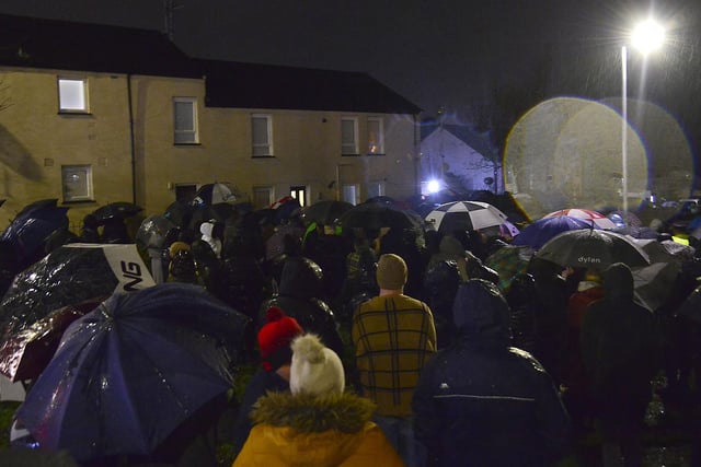 A section of the large crowd which gathered in the rain in Lurgan near where Odhrán Kelly's body was found.