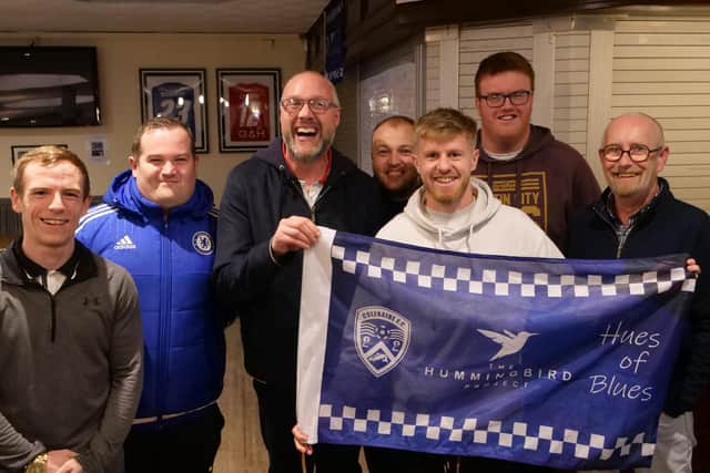 Football fans, players, officials, local businesses, and residents on the North Coast are being asked to fly a thousand “Hues of Blues” flags as part of a first major fundraising campaign between local mental health organisation The Hummingbird Project and Coleraine Football. Credit Coleraine Football Club