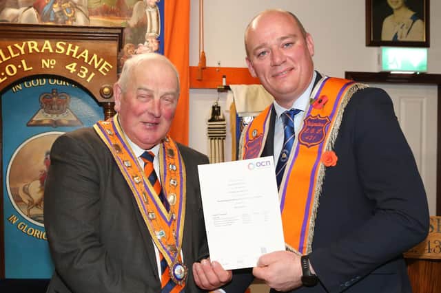 Grand Master presenting a certificate to Wor Bro David Keers Worshipful Master LOL 431