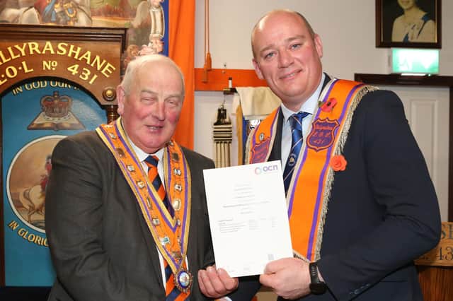 Grand Master presenting a certificate to Wor Bro David Keers Worshipful Master LOL 431