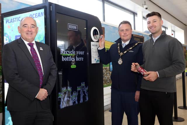 Michael Laverty (Antrim and Newtownabbey Borough Council Director of Sustainability), Mayor, Cllr Mark Cooper and Daniel Perry (Belfast International Airport Environment and Sustainability Officer). (Pic: Stephen Davison).