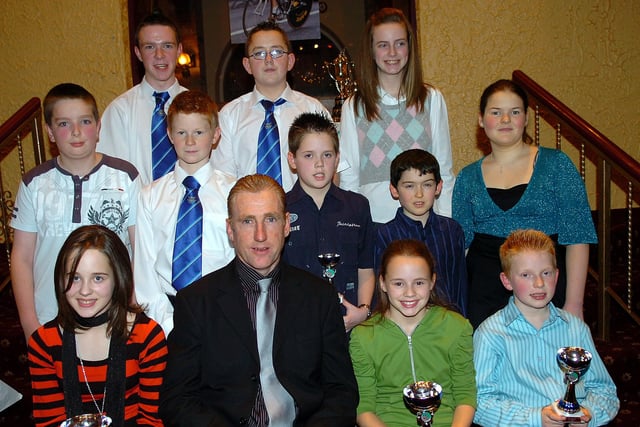 Junior presentation winners of  RT Autoparts East Tyrone CC pictured at the club's 60th anniversary presentation dinner in 2007 with special guest Sean Kelly.