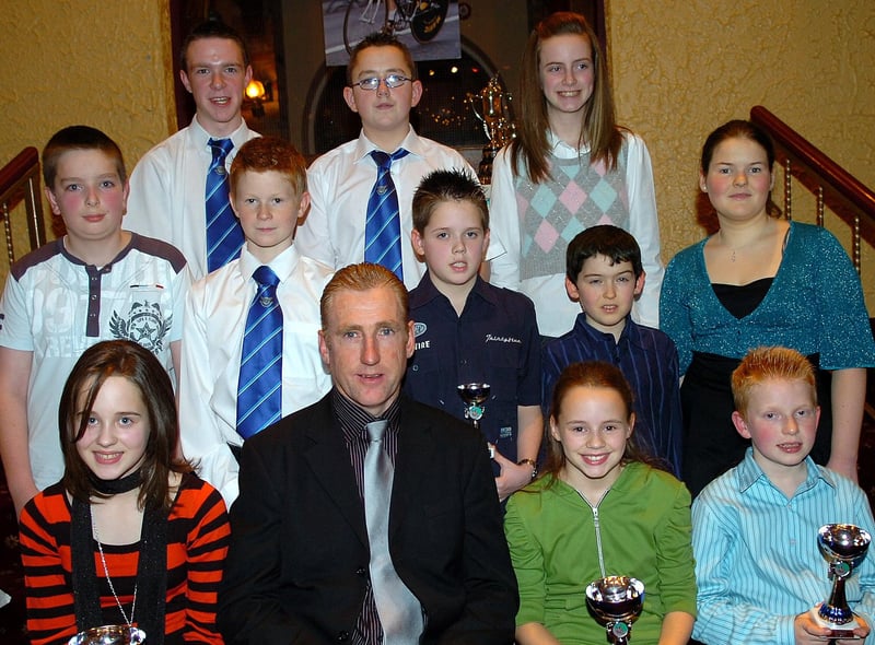 Junior presentation winners of RT Autoparts East Tyrone CC pictured at the club's 60th anniversary presentation dinner in 2007 with special guest Sean Kelly.