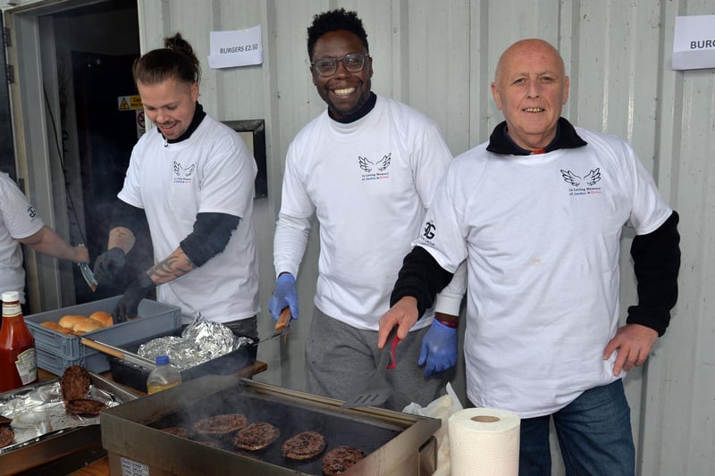 Keeping everyone fed at the charity fun day at Laurelvale Cricket Club are, from left, James McGearity, Joao Teixeira and John McAlinden. PT39-209.