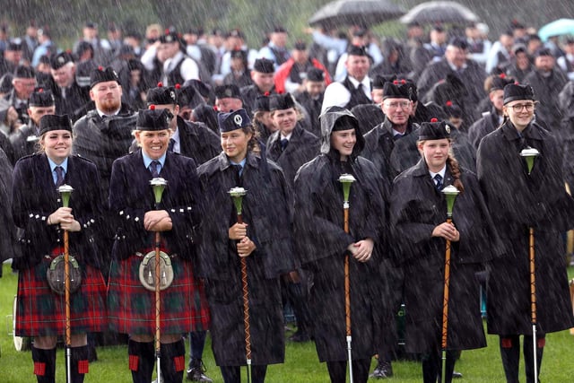 Smiling through the showers at the Ulster Pipe Band and Drum Major Championships on Saturday.