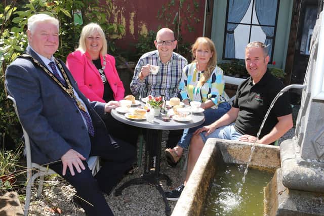 Mayor of Causeway Coast and Glens, Councillor Steven Callaghan, Deputy Mayor, Councillor Margaret-Anne McKillop, Ballycastle Community Hub manager, Dessie Smyth, chair Katie Morgan and Michael Magee from Ballycastle Garden Centre. Credit Causeway Coast and Glens Borough Council