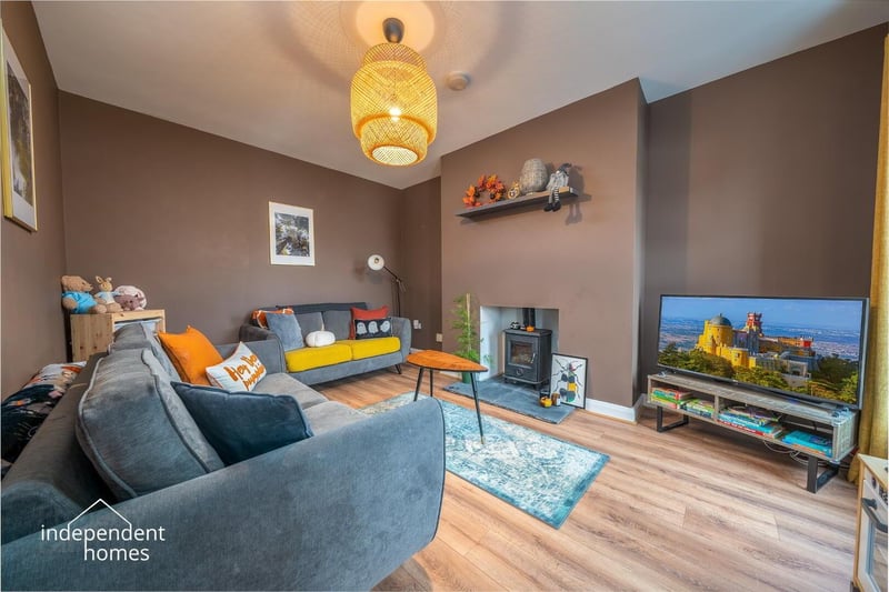Living room with multi-fuel stove.