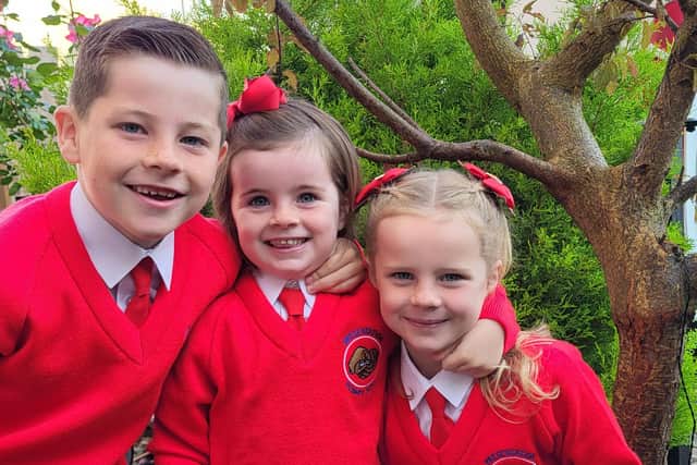 Harvey Connolly, aged 7 who is starting P4  with Grace Connolly, aged 4 who is starting P1 and Amelia Connolly, aged 6 who is starting P3. This trio are all in the Presentation Primary School in Portadown, Co Armagh.