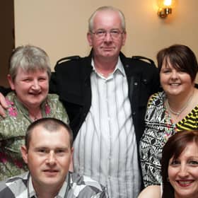 Smiling for our cameraman at a Night at the Races, held in 2008 at Ballymoney Utd Social Club to raise funds for the Laurel House Chemotheraphy Unit on behalf of Rosie McMahon, which was organised by her colleagues and friends at Trolans SuperValu are back row from left, Sharon and Gerard McCrellis, Kate Davies (one of the main organisers) and Alan and Amanda Simpson.