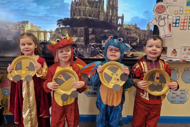 Pupils dressed up as royalty, knights and dragons.