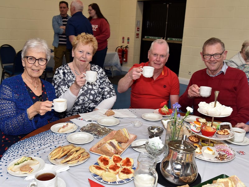 Guests toasting King Charles III at a special  Coronation Tea in Richhill Presbyterian Church Hall. PT17-275.