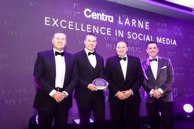 Raymond Lusty from Lusty’s Centra Larne accepts the award for Excellence in Social Media. He is joined by and Musgrave NI Director of Marketing Desi Derby (left), Trevor Davies from category PepsiCo and awards host Pete Snodden.