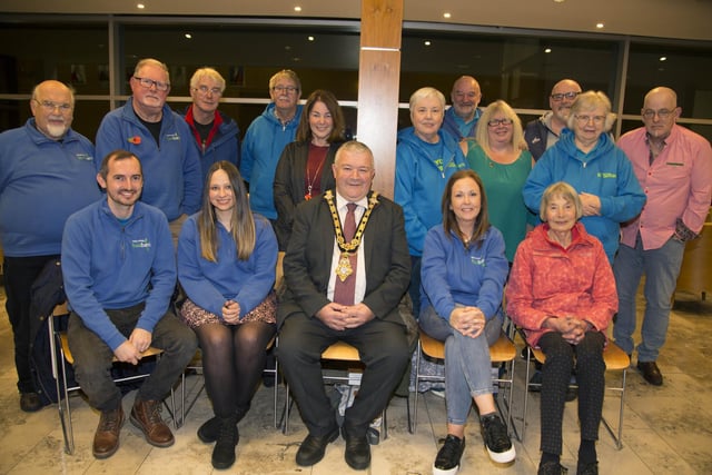 The Mayor of Causeway Coast and Glens Borough Council Councillor Ivor Wallace pictured with some of those from Ballymoney Foodbank who attended the event in Cloonavin to recognise the work of local Food Banks and Christians Against Poverty.