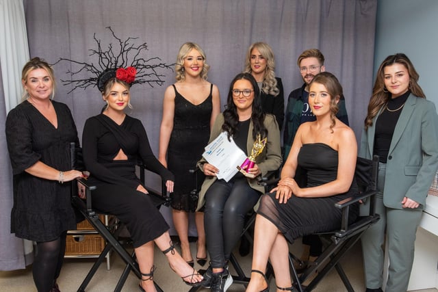 Martina McKenna, fourth from left, pictured with lecturer Joanne Cooke, models Katie McFall, Lauren McNeill and Sinead Cassidy. Also pictured are: judges Emma Bradley, Christopher Young, and Hannah McCurdy. Martina was first in the overall collection, and first in upstyle. 