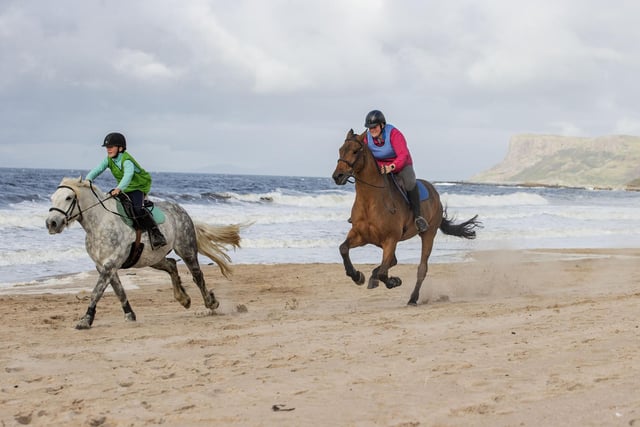 Taking part in the Lammas Fair beach horse racing organised by the RDA and Causeway Coast and Glens Borough Council.