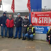 Bus drivers on the picket line outside Magherafelt's Translink bus station on Thursday. Credit: National World