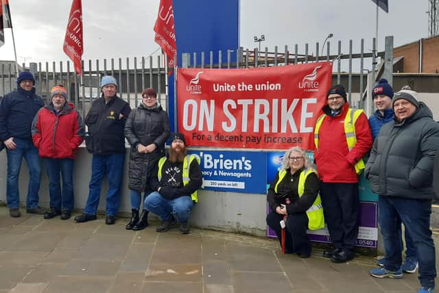 Bus drivers on the picket line outside Magherafelt's Translink bus station on Thursday. Credit: National World