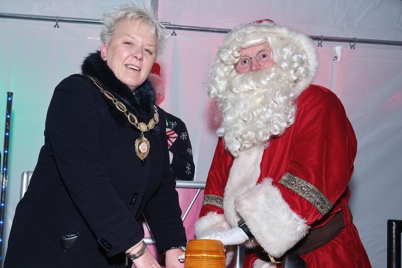 Deputy Chair Cllr Meta Graham and Santa switch on the lights in Magherafelt on Saturday.