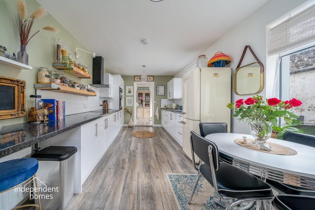 Kitchen with high and low level units.