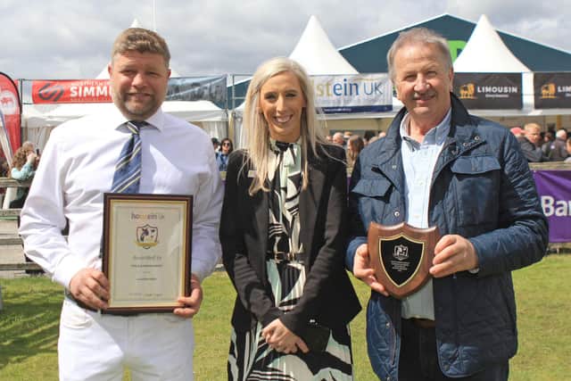 Upper Bann MP Carla Lockhart congratulates Philip and Simon Haffey from the Glasson Herd. Picture: Julie Hazelton