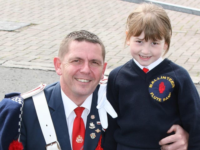 THAT'S MY GIRL...Phil and Natasha Blackmore of Ballinteer Flute Band pictured during the Coleraine Twelfth in 2008.