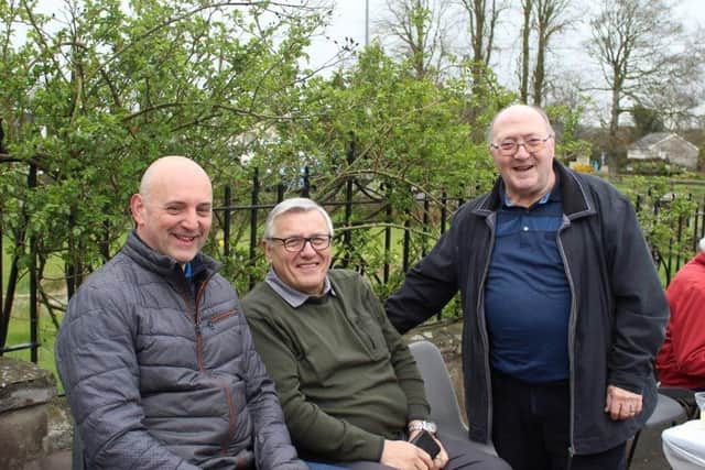 Visitors included (left to right) suppliers Mervyn Wilson from Wilson’s Freshways and Joshua Lawrence from Lawrence’s Cake Shop, who are joined by previous store owner John Devlin.