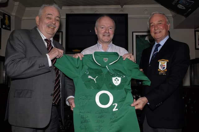 Aidan O'Kane (left, Portadown Rugby Club past president) and David Redpath (right, Portadown Rugby Club president) during the presentation of an Ireland jersey signed by Stephen Ferris to Charlie McKeever for display in McKeever's Bar.INPT20-213
PTRUGBY12