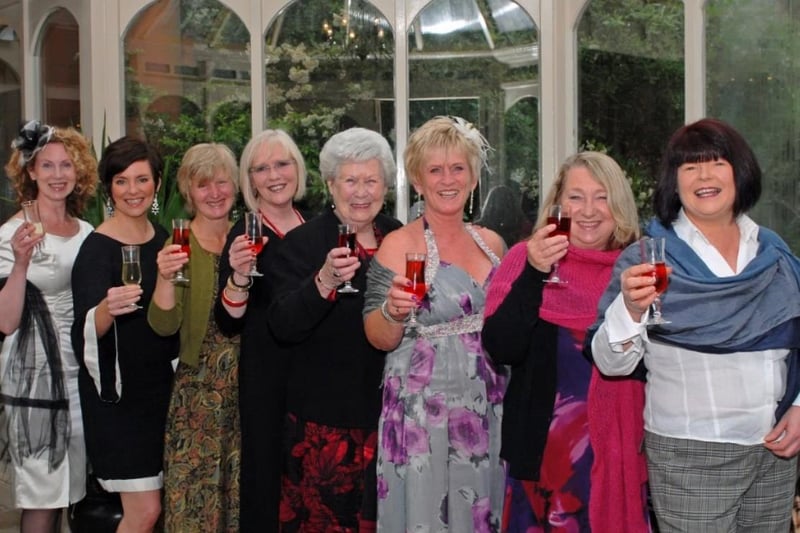 A group of ladies smiling for the camera at the Ladies Who Lunch charity fundraiser in aid of NI Leukaemia Research in Magheramorne House in 2012.