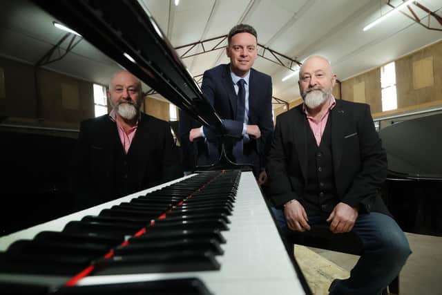 Ulster Bank business development manager Lee White and Belfast Pianos owner Steven Russell who has set up a new warehouse between Lurgan and Moira.