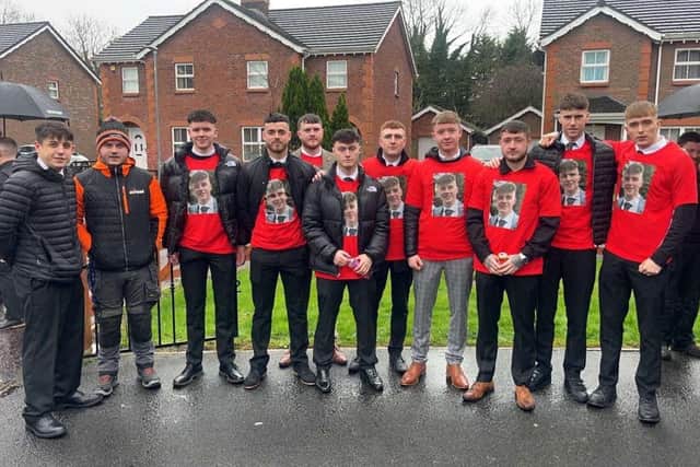Some friends of Matthew McGrath, aged 22, who attended his funeral in Aghagallon, Co Antrim last week.