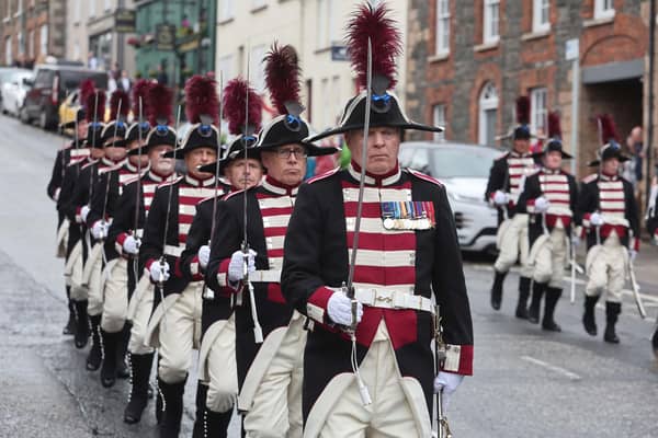 The Hillsborough Fort Guard parade through the village of Royal Hillsborough