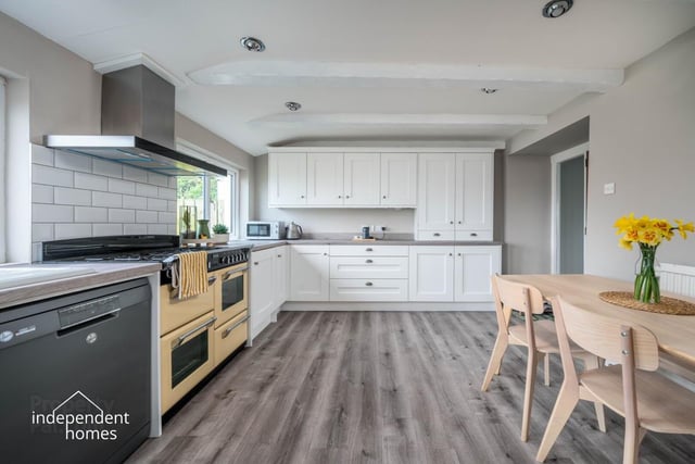 Modern kitchen with high and low level units.