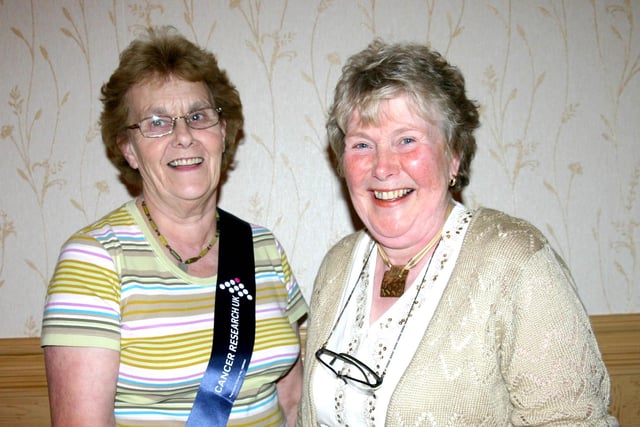 Roberta McBride presents a cheque to Treasurer of Cancer Research Ballycastle Branch Betty Wilkinson at a quiz held in the Marine Hotel in 2007. Roberta raised the money in lieu of gifts at her 60th Birthday