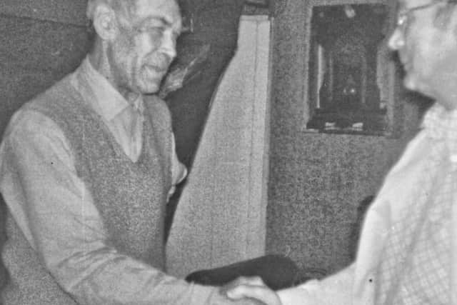 This is the moment when the author's father and his brother, Packy, were reunited at the family farm 45 years after his father left for Canada. They would never see each other again after this brief visit. Credit: John Heagney
